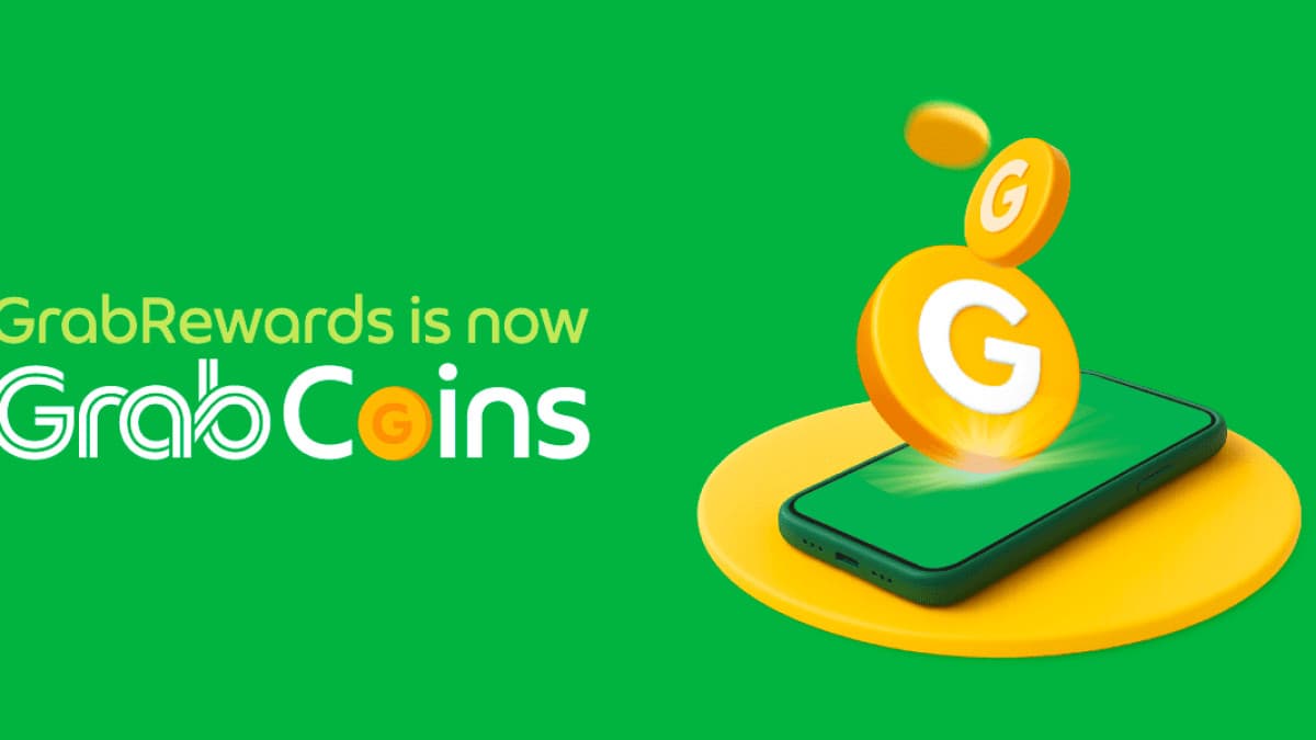 GrabCoins rewards program artwork showing gold coins with the Grab logo