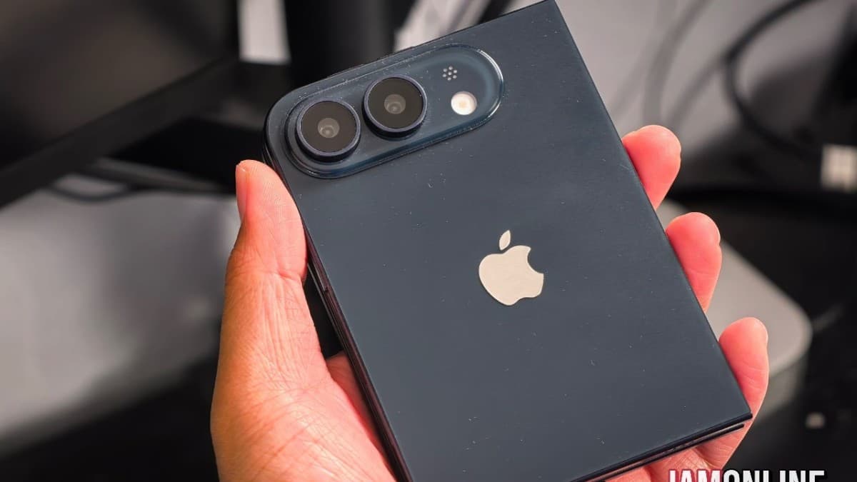 iPhone 18 Fold prototype dummy unit in hand showing wide form factor