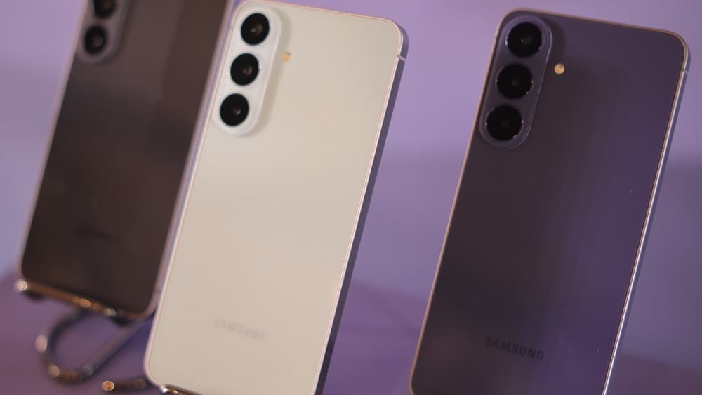 Samsung Galaxy S26 FE phones in Blueberry, Graphite, and Pistachio colors