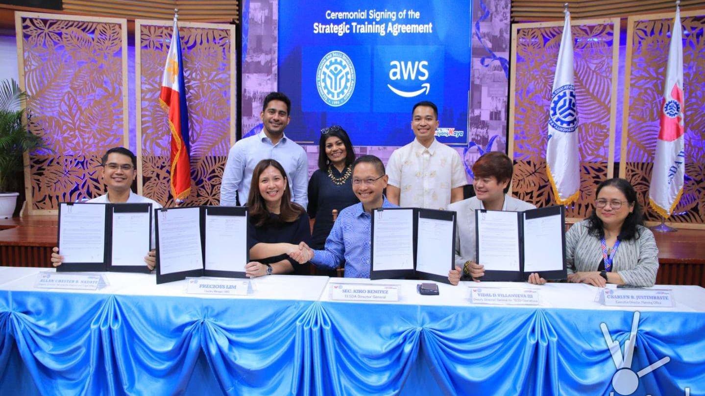 TESDA and AWS officials at the ceremonial signing of their Strategic Training Agreement