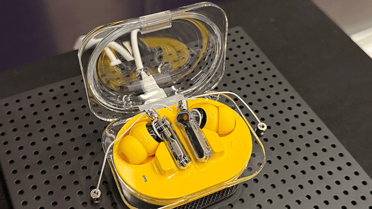 Nothing Ear (3a) wireless earbuds in yellow with transparent stems and charging case